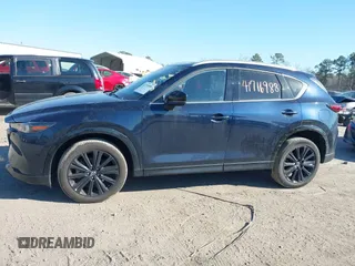2022 Mazda CX-5 2.5 Turbo with VIN JM3KFBAY4N0534690, listed as a IAAI auction lot 41716988 with 23,910 mi miles and . Bid and sale history available at carsss.com. Image 14.
