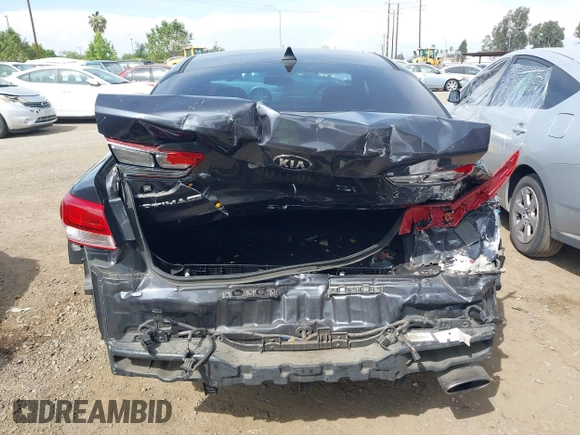 2018 Kia Optima LX z VIN KNAGT4L36J5216858, wystawiony jako IAAI lot #42149047 z przebiegiem 121 845 mil mil oraz . Historia ofert i sprzedaży dostępna na DreamBid. Obrazek 17.