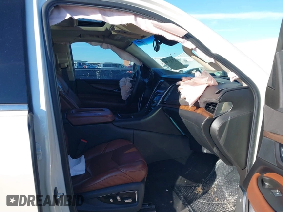 2015 Cadillac Escalade Luxury z VIN 1GYS3MKJXFR651714, wystawiony jako IAAI lot #41205449 z przebiegiem 129 066 mil mil oraz . Historia ofert i sprzedaży dostępna na DreamBid. Obrazek 5.