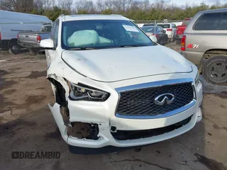 2016 Infiniti QX60 with VIN 5N1AL0MM8GC515986, listed as a IAAI auction lot 41223590 with 99,789 mi miles and . Bid and sale history available at DreamBid. Image 1.