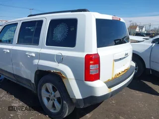 2014 Jeep Patriot Latitude with VIN 1C4NJPFA8ED550221, listed as a IAAI auction lot 41919419 with 185,386 mi miles and . Bid and sale history available at carsss.com. Image 6.