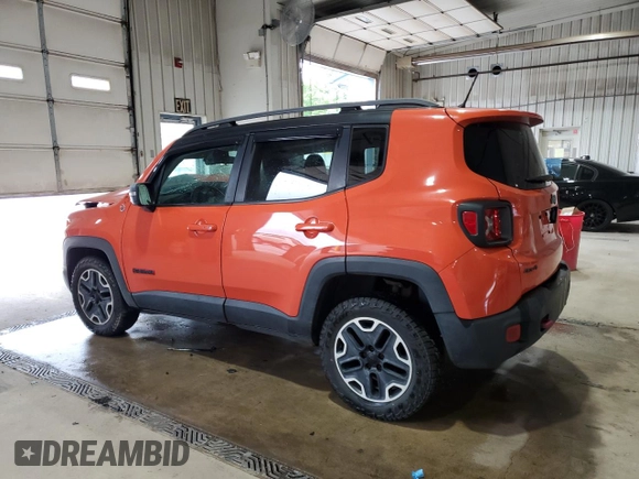 2015 Jeep Renegade Trailhawk with VIN ZACCJBCTXFPB80067, listed as a Copart auction lot 64927985 with Not provided miles and Salvage title. Bid and sale history available at DreamBid. Image 2.