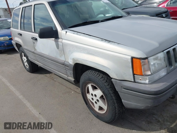 1994 Jeep Grand Cherokee Laredo with VIN 1J4GZ58YXRC325868, listed as a IAAI auction lot 42664900 with 220,149 mi miles and . Bid and sale history available at DreamBid. Image 12.