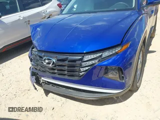 2022 Hyundai Tucson SEL with VIN 5NMJB3AE3NH059349, listed as a IAAI auction lot 42330576 with 27,010 mi miles and . Bid and sale history available at DreamBid. Image 12.