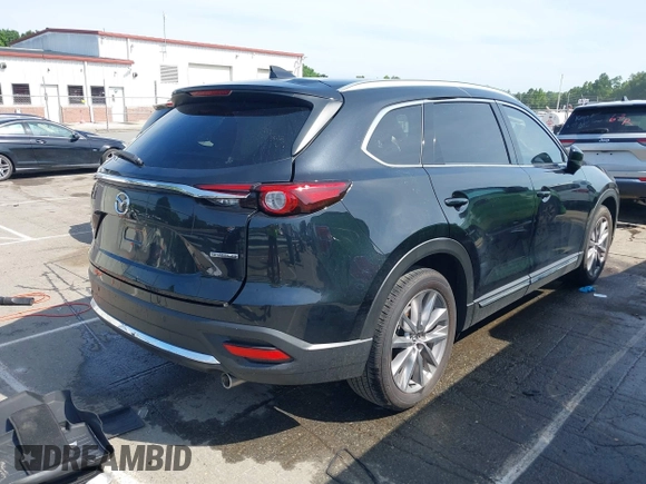 2021 Mazda CX-9 Carbon Edition with VIN JM3TCBDY3M0524241, listed as a IAAI auction lot 42538127 with 50,533 mi miles and . Bid and sale history available at DreamBid. Image 4.