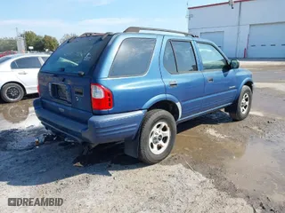 2004 Isuzu Rodeo S with VIN 4S2CK58W944317209, listed as a IAAI auction lot 41498160 with 114,764 mi miles. Bid and sale history available at carsss.com. Image 4.
