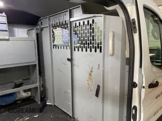 2020 Ford Transit Cargo with VIN 1FTBR1Y87LKA53852, listed as a IAAI auction lot 42300106 with 89,023 mi miles and . Bid and sale history available at DreamBid. Image 22.