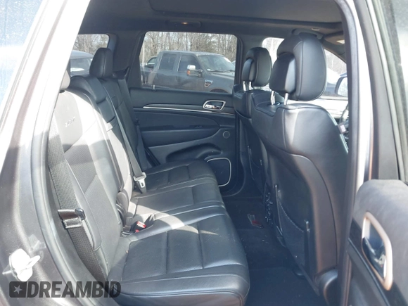 2015 Jeep Grand Cherokee Summit with VIN 1C4RJFJG8FC679185, listed as a IAAI auction lot 41653531 with 158,186 mi miles and . Bid and sale history available at DreamBid. Image 8.