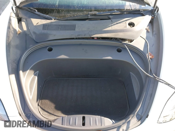 2023 Tesla Model 3 with VIN 5YJ3E1EA2PF582331, listed as a IAAI auction lot 41043858 with 33,601 mi miles and . Bid and sale history available at DreamBid. Image 10.