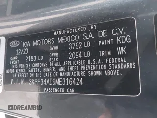 2021 Kia Forte GT-Line z VIN 3KPF34AD9ME316424, wystawiony jako IAAI lot #41467687 z przebiegiem 86 059 mil mil oraz . Historia ofert i sprzedaży dostępna na DreamBid. Obrazek 9.