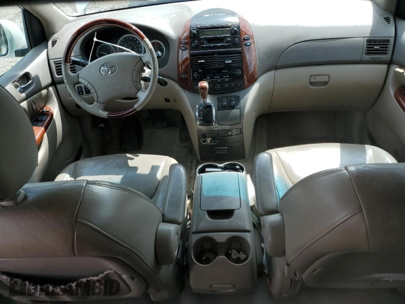 2004 Toyota Sienna XLE z VIN 5TDZA22C04S170319, wystawiony jako Copart lot #56543265 z przebiegiem 184 061 mil mil oraz Szkoda całkowita • Salvage title. Historia ofert i sprzedaży dostępna na DreamBid. Obrazek 8.