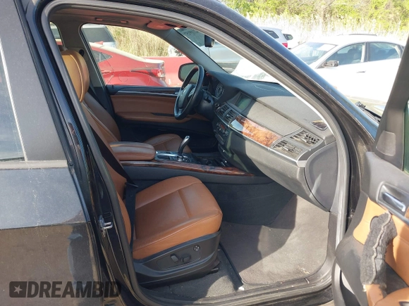 2010 BMW X5 35d with VIN 5UXFF0C52ALJ99499, listed as a IAAI auction lot 42109157 with 126,797 mi miles. Bid and sale history available at carsss.com. Image 5.