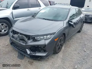 2017 Honda Civic Hatchback EX with VIN SHHFK7H51HU406507, listed as a IAAI auction lot 41970740 with 63,821 mi miles. Bid and sale history available at carsss.com. Image 2.