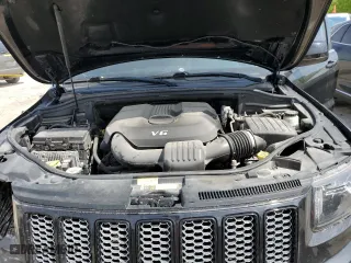 2015 Jeep Grand Cherokee Laredo with VIN 1C4RJFAG5FC724874, listed as a Copart auction lot 52462214 with 99,650 mi miles and Salvage Title. Bid and sale history available at carsss.com. Image 11.