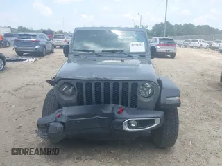 2023 Jeep Gladiator Sport S с VIN 1C6HJTAG7PL522721, выставлен на аукционе IAAI как лот 42594463 с пробегом 64 702 миль миль и . История ставок и продаж доступна на DreamBid. Изображение 6.