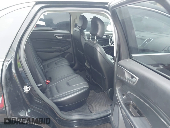 2015 Ford Edge Titanium z VIN 2FMTK4K96FBB24674, wystawiony jako IAAI lot #42403892 z przebiegiem 113 816 mil mil oraz . Historia ofert i sprzedaży dostępna na DreamBid. Obrazek 8.