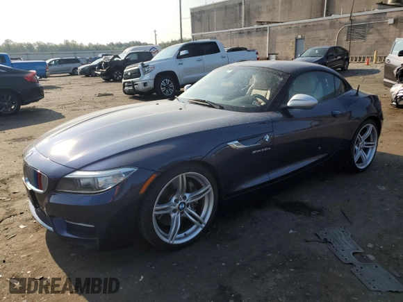 2014 BMW Z4 sDrive35is with VIN WBALM1C57EE634167, listed as a Copart auction lot 69088044 with 68,620 mi miles and Salvage title. Bid and sale history available at DreamBid. Image 1.