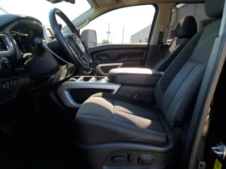 2021 Nissan Titan SV с VIN 1N6AA1EFXMN509569, выставлен на аукционе Copart как лот 52285595 с пробегом 70 296 миль миль и На запчасти • Non repairable. История ставок и продаж доступна на DreamBid. Изображение 7.