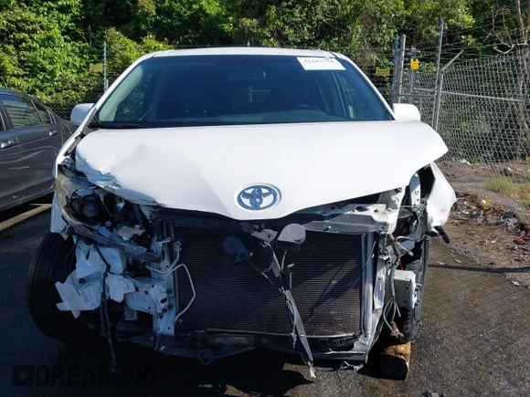2015 Toyota Sienna SE with VIN 5TDXK3DC0FS657546, listed as a IAAI auction lot 42183750 with 137,157 mi miles and . Bid and sale history available at DreamBid. Image 13.