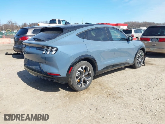 2023 Ford Mustang Mach-E Premium z VIN 3FMTK3SU3PMA65341, wystawiony jako IAAI lot #41747617 z przebiegiem 3 430 mil mil oraz . Historia ofert i sprzedaży dostępna na DreamBid. Obrazek 4.