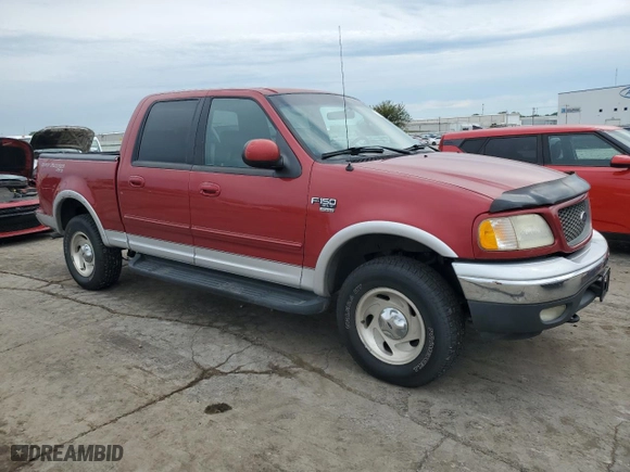 2001 Ford F-150 SuperCrew XLT with VIN 1FTRW08L81KA41003, listed as a Copart auction lot 72388534 with 319,211 mi miles and Salvage Title. Bid and sale history available at carsss.com. Image 4.