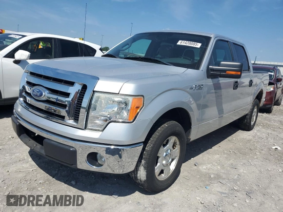 2010 Ford F-150 XL with VIN 1FTEW1C88AFA71473, listed as a Copart auction lot 61420085 with 143,965 mi miles and Salvage title. Bid and sale history available at DreamBid. Image 1.