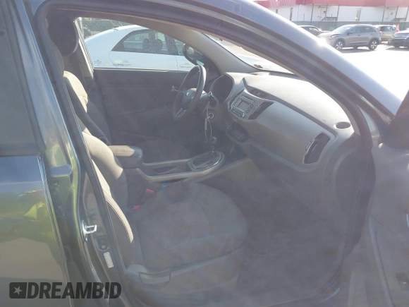 2015 Kia Sportage LX with VIN KNDPBCAC2F7764189, listed as a IAAI auction lot 42144059 with 181,247 mi miles and . Bid and sale history available at carsss.com. Image 5.