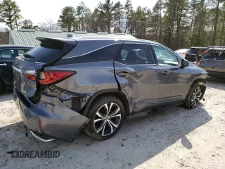 2018 Lexus RX 350L Premium with VIN JTJDZKCA8J2009751, listed as a Copart auction lot 51042215 with 104,454 mi miles and Salvage Title. Bid and sale history available at DreamBid. Image 3.