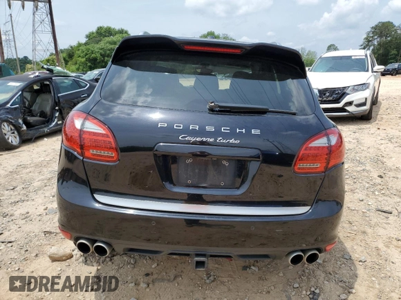 2012 Porsche Cayenne Turbo с VIN WP1AC2A25CLA83496, выставлен на аукционе Copart как лот 60897805 с пробегом 234 808 миль миль и Списание • Salvage title. История ставок и продаж доступна на DreamBid. Изображение 6.