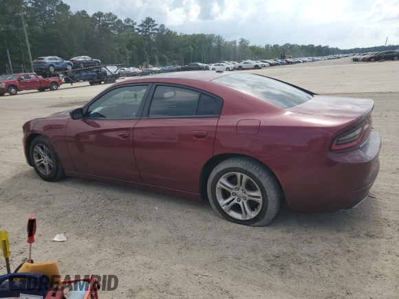 2019 Dodge Charger SXT with VIN 2C3CDXBG4KH721185, listed as a Copart auction lot 57872325 with 123,429 mi miles and Salvage title. Bid and sale history available at DreamBid. Image 2.