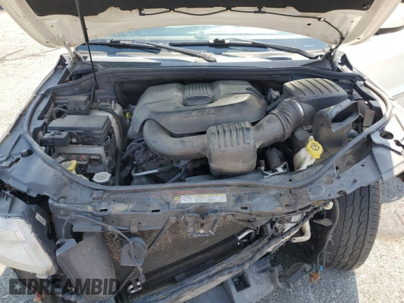 2011 Jeep Grand Cherokee Laredo with VIN 1J4RR4GG6BC657520, listed as a Copart auction lot 63558355 with 215,444 mi miles and Salvage title. Bid and sale history available at DreamBid. Image 12.
