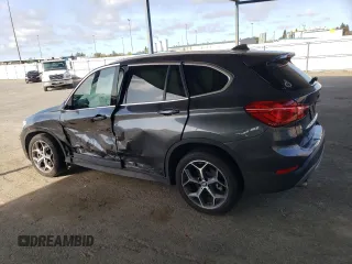 2017 BMW X1 sDrive28i with VIN WBXHU7C34HP924730, listed as a Copart auction lot 52245005 with 0 mi miles and Salvage Title. Bid and sale history available at carsss.com. Image 2.