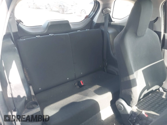 2013 Scion iQ with VIN JTNJJXB04DJ024322, listed as a IAAI auction lot 42618525 with 154,559 mi miles and . Bid and sale history available at DreamBid. Image 8.
