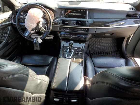 2016 BMW 5 Series 535i xDrive with VIN WBA5B3C55GG260630, listed as a Copart auction lot 58806995 with 72,028 mi miles and Salvage title. Bid and sale history available at DreamBid. Image 8.