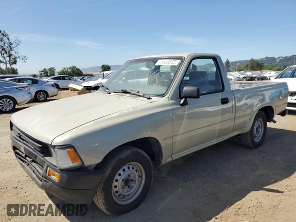 1992 Toyota Pickup z VIN JT4RN81A1N0094217, wystawiony jako Copart lot #56062545 z przebiegiem 242 256 mil mil oraz Szkoda całkowita • Salvage title. Historia ofert i sprzedaży dostępna na DreamBid. Obrazek 1.