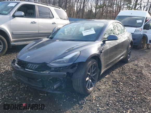 2023 Tesla Model 3 with VIN 5YJ3E1EAXPF666252, listed as a IAAI auction lot 42009929 with 27,328 mi miles and . Bid and sale history available at DreamBid. Image 21.