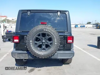 2020 Jeep Wrangler Unlimited Freedom with VIN 1C4HJXDG0LW238819, listed as a IAAI auction lot 42139357 with 67,619 mi miles and . Bid and sale history available at DreamBid. Image 16.