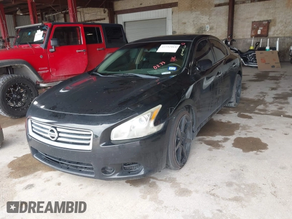 2014 Nissan Maxima S with VIN 1N4AA5AP9EC476138, listed as a IAAI auction lot 42732164 with 105,724 mi miles and . Bid and sale history available at DreamBid. Image 2.