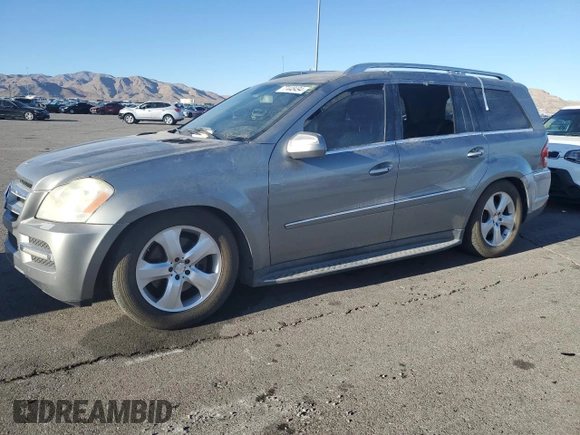 2010 Mercedes-Benz GL-Class GL 450 with VIN 4JGBF7BE9AA582406, listed as a Copart auction lot 77448494 with 124,849 mi miles and Clean Title. Bid and sale history available at carsss.com. Image 1.