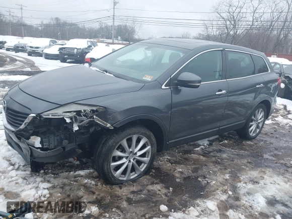2014 Mazda CX-9 Grand Touring with VIN JM3TB3DV9E0440506, listed as a IAAI auction lot 41537718 with 217,299 mi miles and . Bid and sale history available at DreamBid. Image 20.