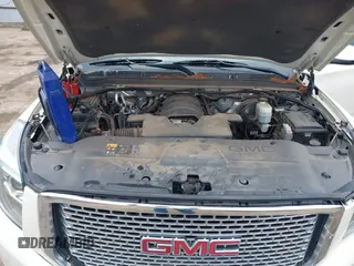 2015 GMC Yukon Denali with VIN 1GKS2CKJ7FR737165, listed as a IAAI auction lot 41914478 with 156,059 mi miles. Bid and sale history available at carsss.com. Image 10.