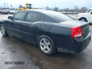 2010 Dodge Charger SXT with VIN 2B3CA3CV7AH144369, listed as a IAAI auction lot 41911678 with 235,218 mi miles. Bid and sale history available at carsss.com. Image 3.
