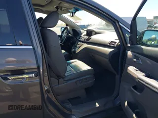 2013 Honda Odyssey Touring with VIN 5FNRL5H95DB045666, listed as a IAAI auction lot 42117219 with 50,715 mi miles and . Bid and sale history available at carsss.com. Image 5.