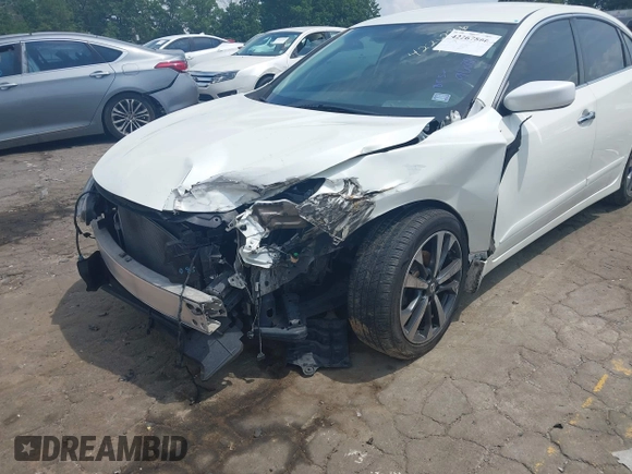 2016 Nissan Altima SR with VIN 1N4AL3AP7GC219688, listed as a IAAI auction lot 42267866 with 110,786 mi miles and . Bid and sale history available at DreamBid. Image 6.