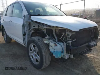 2009 Toyota RAV4 with VIN JTMBF33VX9D001291, listed as a IAAI auction lot 41792376 with 104,318 mi miles and . Bid and sale history available at DreamBid. Image 6.