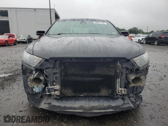 2013 Ford Taurus SHO z VIN 1FAHP2KTXDG168636, wystawiony jako Copart lot #56921795 z przebiegiem 121 103 mil mil oraz Szkoda całkowita • Salvage title. Historia ofert i sprzedaży dostępna na DreamBid. Obrazek 5.