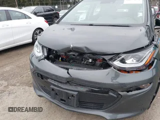 2021 Chevrolet Bolt EV LT z VIN 1G1FY6S0XM4108670, wystawiony jako IAAI lot #41625671 z przebiegiem 20 859 mil mil oraz . Historia ofert i sprzedaży dostępna na DreamBid. Obrazek 6.