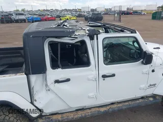 2021 Jeep Gladiator High Altitude z VIN 1C6HJTFG2ML567988, wystawiony jako IAAI lot #42103576 z przebiegiem 74 849 mil mil oraz . Historia ofert i sprzedaży dostępna na DreamBid. Obrazek 6.