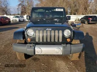 2010 Jeep Wrangler Unlimited Sahara with VIN 1J4BA5H18AL207844, listed as a Copart auction lot 48316825 with 221,599 mi miles and Clean Title. Bid and sale history available at carsss.com. Image 5.