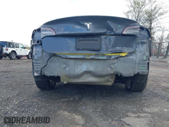 2022 Tesla Model 3 Long Range z VIN 5YJ3E1EB2NF203477, wystawiony jako IAAI lot #42037932 z przebiegiem 56 509 mil mil oraz . Historia ofert i sprzedaży dostępna na DreamBid. Obrazek 6.